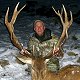 Rodney takes a red stag in the snowy Southern Alps
