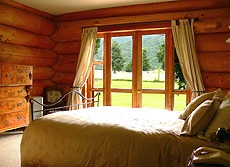 Peel Forest Lodge's master bedroom with ensuite offers tremendous views.
